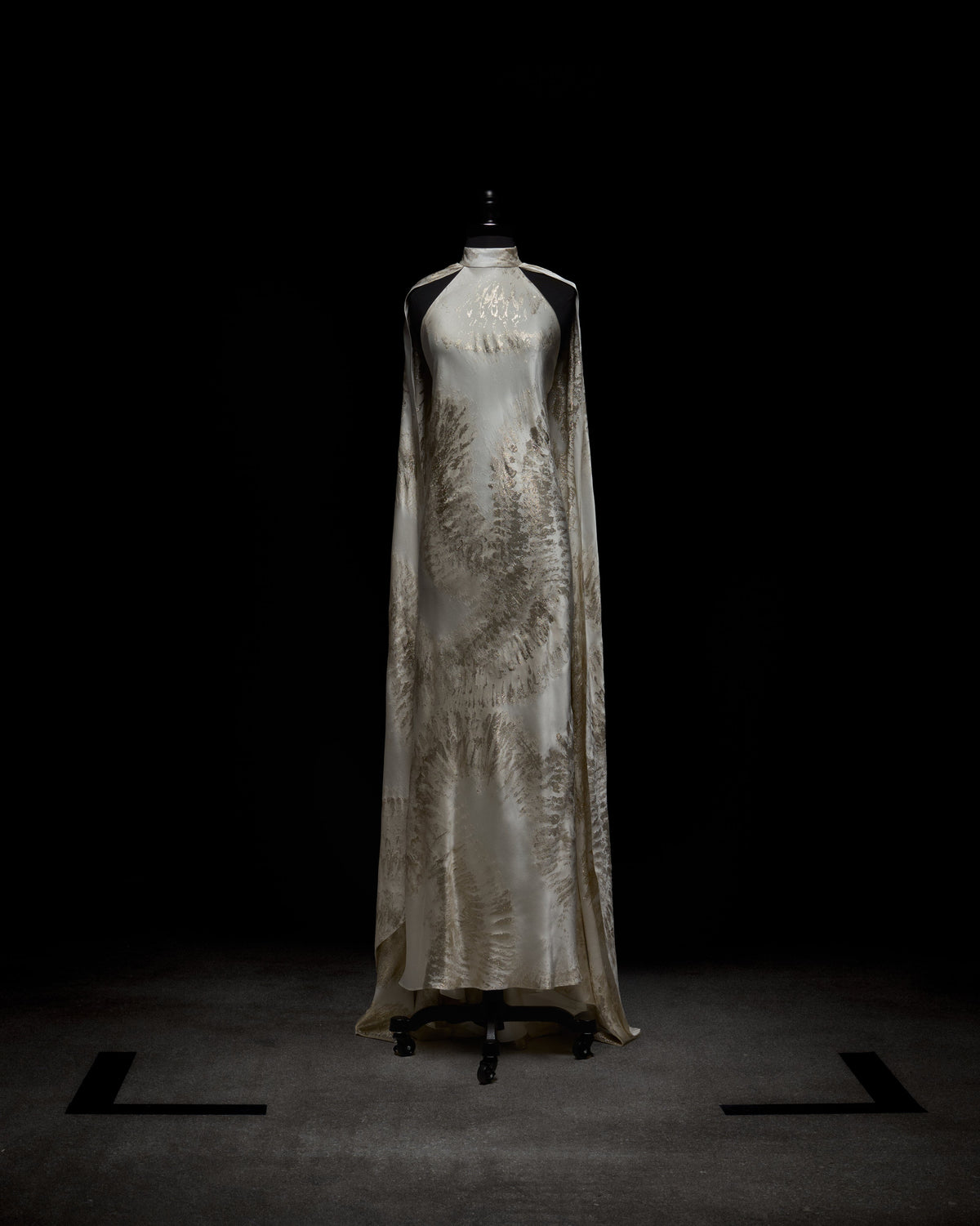 Elegant Feather Trimmed Silk Gown